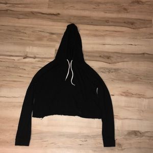 This is a cropped long sleeved shirt